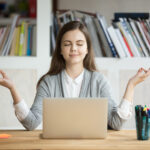 Revising Student in a Zen Pose